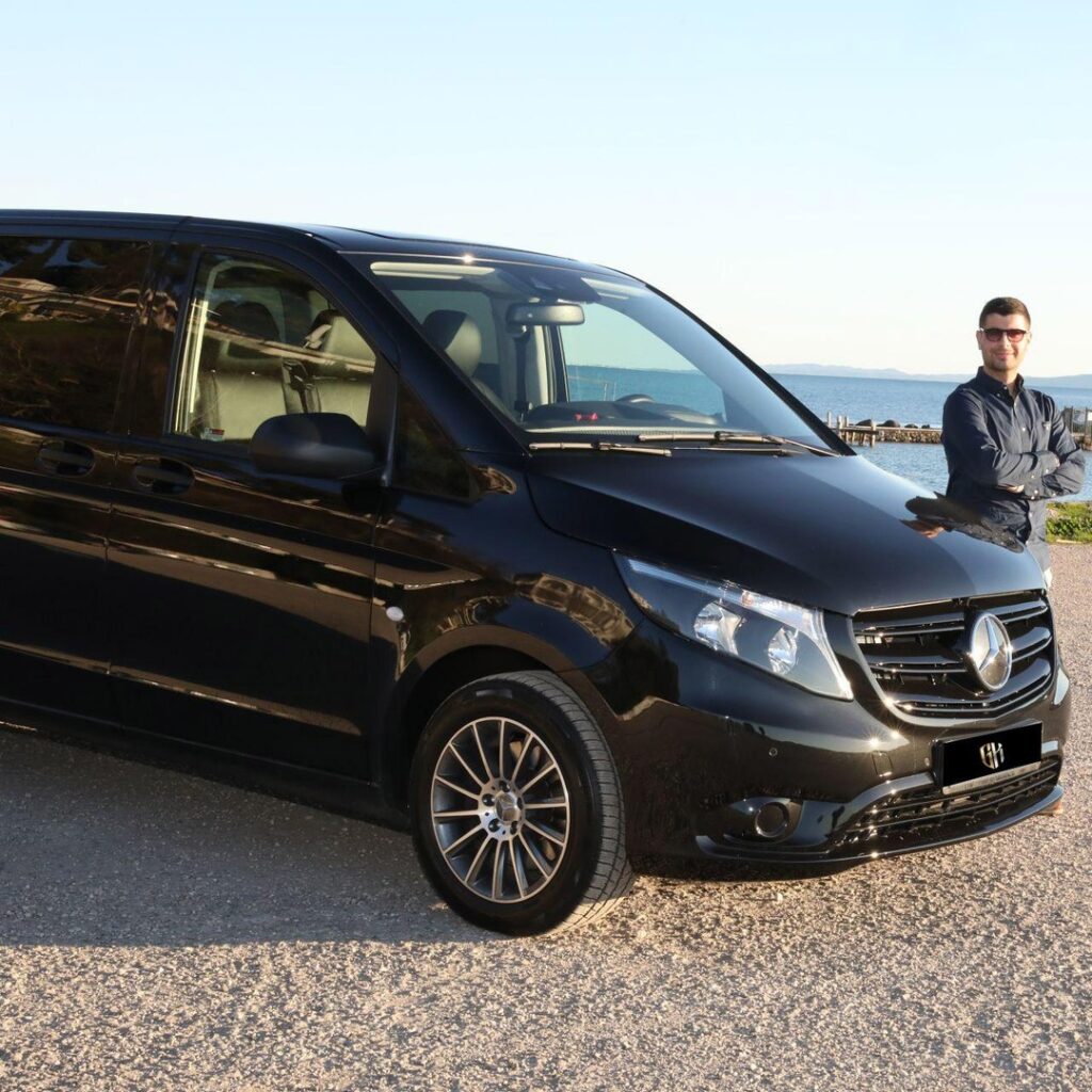 Paleokastritsa Plus Corfu Town: A Two-Anchor Private Minivan Tour 3 Private Mercedes minivan with driver beside it