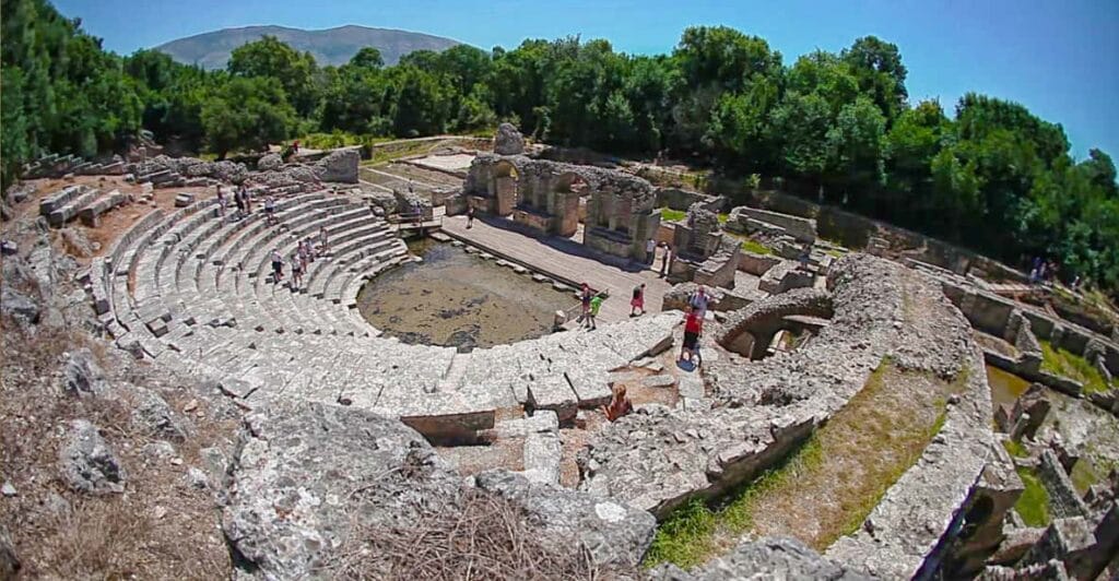 Saranda and Butrint from Corfu: The Booking Option Changes the Entire Day 3 Ancient theatre seating and stage remains at Butrint National Park