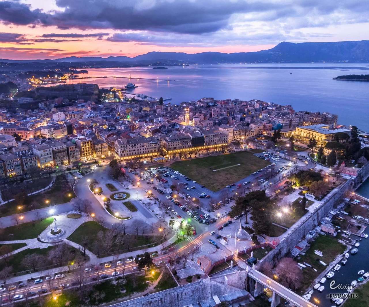 Aerial view of Corfu Old Town and the Ionian Sea at sunset