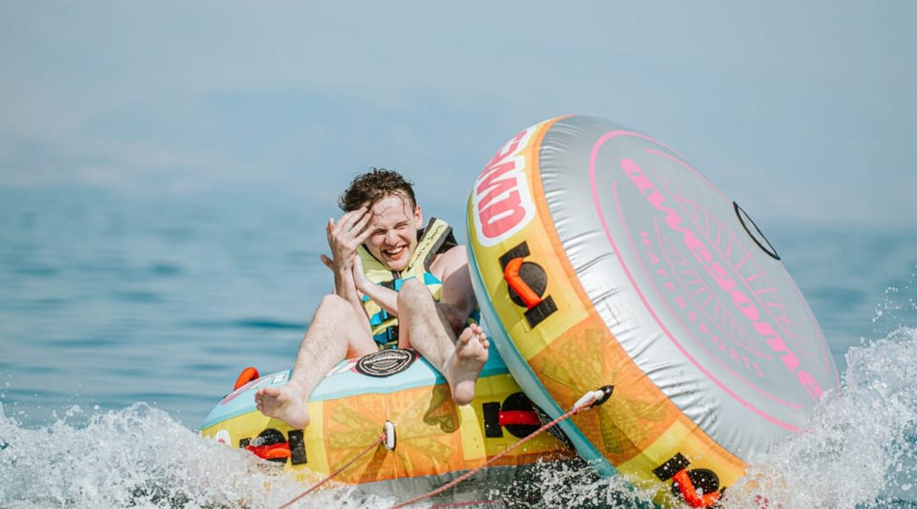 Corfu Watersports: Unleash Family Fun with Thrilling Inflatable Rides Near Corfu Town!